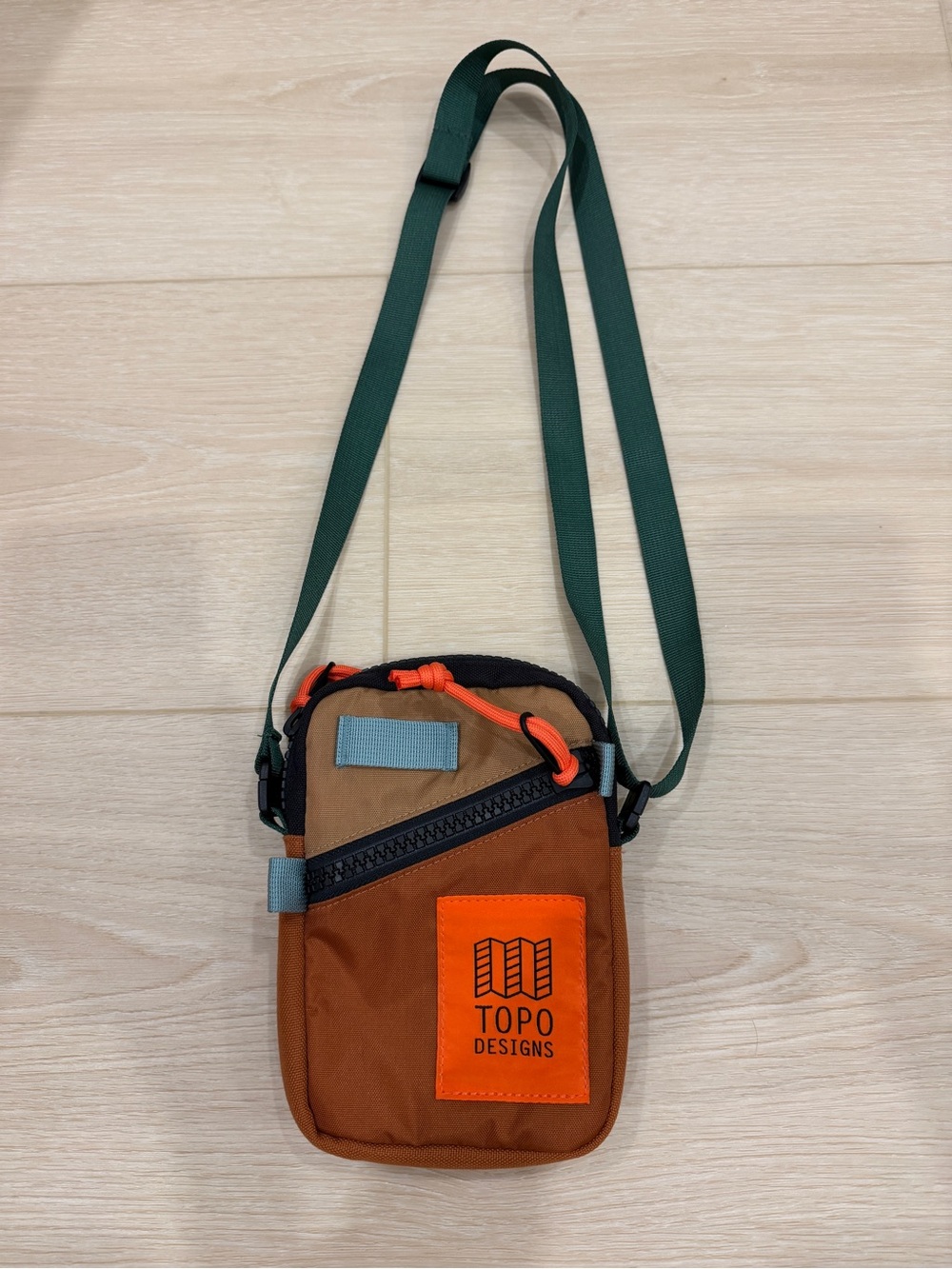 Topo Designs Brown and Orange Men’s Crossbody Pouch with Green Strap